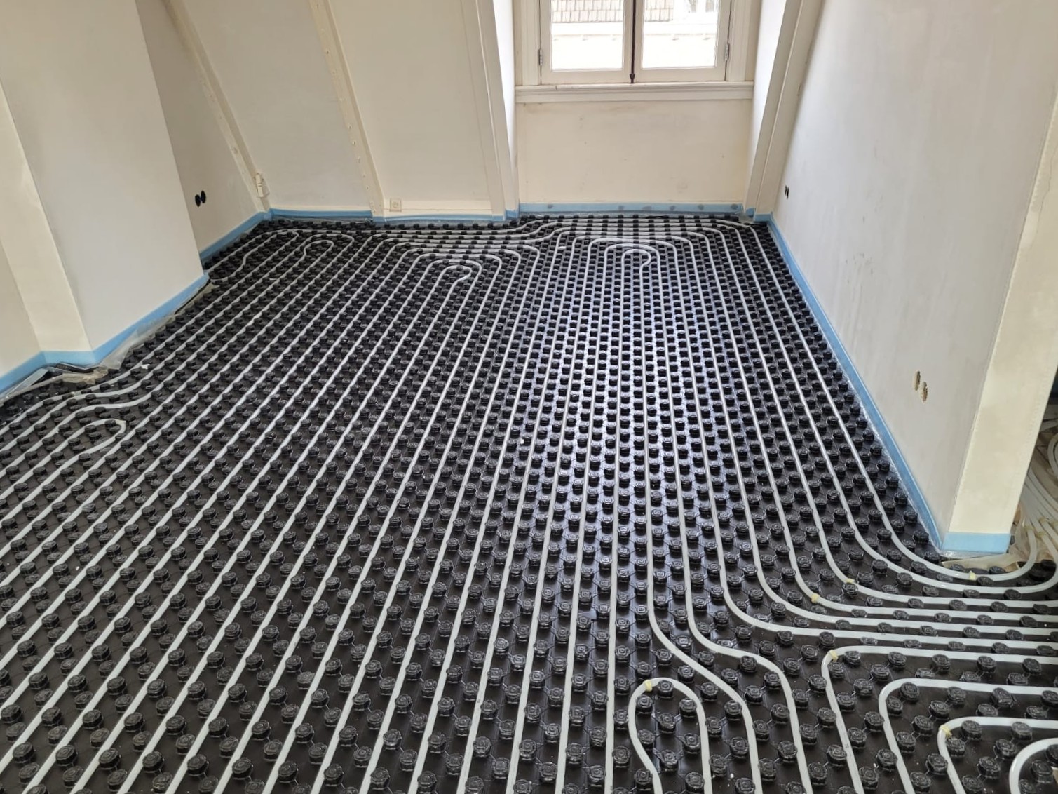 Opbouw betonvloer met vloerverwarming
