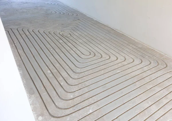 Vloerverwarming in beton frezen